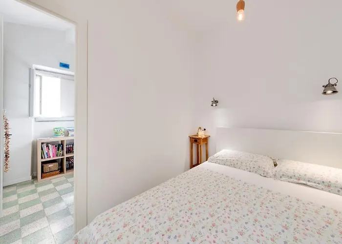 Between The Roofs Of Old Town And The Sea Menton