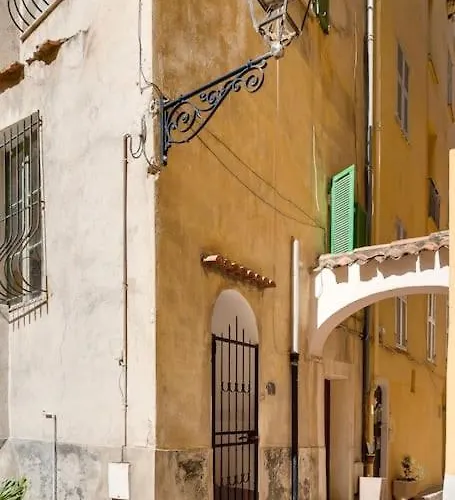 Between The Roofs Of Old Town And The Sea
